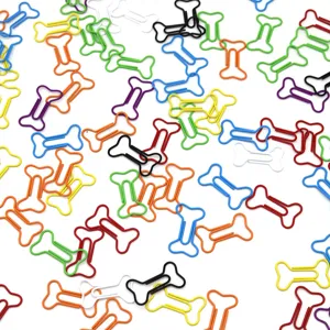 Gedetailleerd overzicht van kleurrijke botvormige metalen paperclips en bladwijzers.