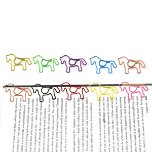 Colorful horse-shaped metal paper clips and bookmarks set for creative office supplies.