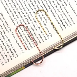 Large 100mm metal paper clips in gold and rose gold, perfect for document organization.