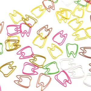 Colorful tooth-shaped metal paper clips, creative shaped clips for office stationery and data sorting.