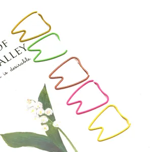 Creative tooth shaped metal paper clips in multi colors for office stationery sorting.