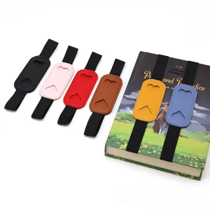 Detailed view of colorful PU leather pen holders with elastic bands for notebooks and journals.