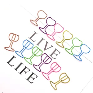 Colorful metal paper clips in wine glass shape, creative office stationery for documents.