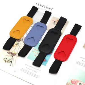 Detailed view of colorful PU leather pen holder elastic bands with heart cutouts for notebooks.