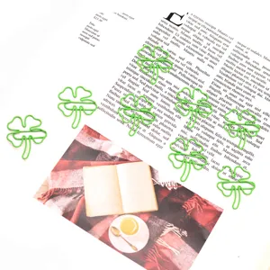 Cute green four-leaf clover metal paper clips, creative bookmark and planner clips for office and school.
