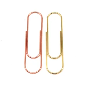 Large 100mm metal paper clips set, rose gold and gold stationery for document organization.