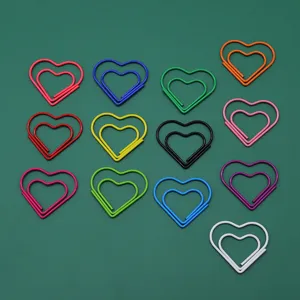 Colorful heart-shaped paper clips set, metal cute bookmarks and office memo document clips.