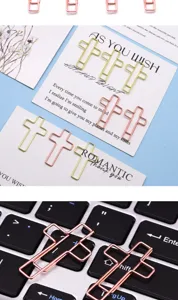 Creative metal cross paper clips in gold and rose gold for office stationery and notes.
