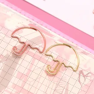 Graziose graffette in metallo a forma di ombrello in oro rosa e oro per ufficio