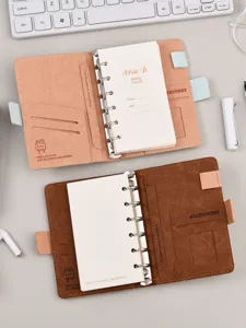 Taccuino tascabile A6 in pelle con raccoglitore ad anelli, agenda portatile con tasche.