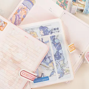 Cute 12 constellations magnetic buckle notebook planner with original anime art and colorful pages.