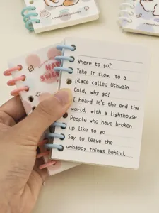 Cute mini pocket loose-leaf notebook detail view, lined paper with English poetry print.