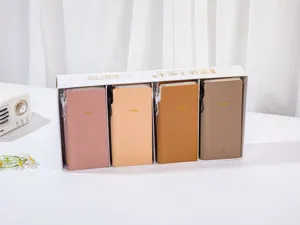 Set di quaderni planner minimalisti in quattro caldi colori della terra in scatola regalo