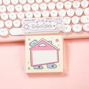 Blocco note adesivo con simpatico disegno e carta d'intestazione rosa per appunti.