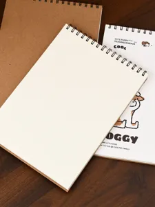 Carnet de croquis et bloc-notes à spirale A4 avec adorable design de chiot pour les artistes.