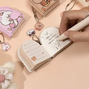 Cute mini keychain notebook set with adorable pendant cartoon designs for backpack and keys cute gift