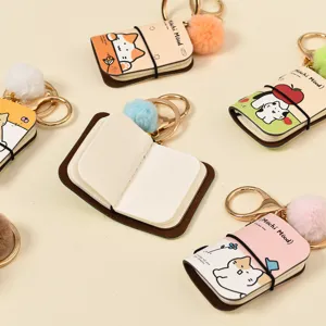 Miniature notebook keychain PU leather cute cartoon cat design fluffy pom pom accessory