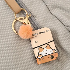 Mini PU leather notebook keychain with plush pom pom, cute cat bag pendant charm.