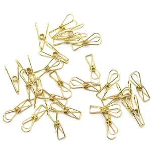 Mini pinces à papier métalliques dorées, pinces trombones forme poisson pour organisation de bureau.