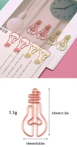 Graffette metalliche creative a forma di lampadina in oro e oro rosa per ufficio.