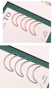 Clips de papier métalliques en forme de lune, dorés et argentés pour bureau détail.