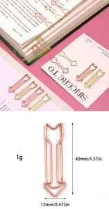 Creative metal arrow paper clips for office document binding and book page marking.