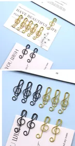 Goldene und schwarze Metall Noten Büroklammern, kreative Violinschlüssel Lesezeichen Büro.