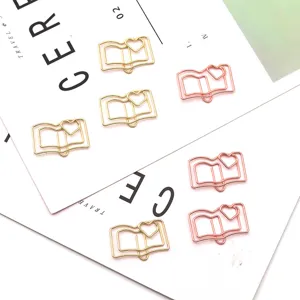 Cute book shape metal paperclips in gold and rose gold, perfect for office stationery.