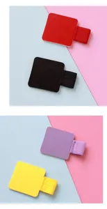 PU leather self-adhesive pen loop holder with elastic band for notebooks and tablet planners.