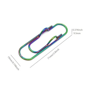Creative metal rainbow pen clip and paperclip for notebooks, colorful durable design.