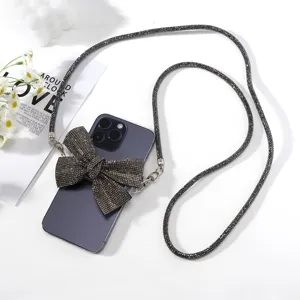 Lussuosa catena per telefono a tracolla con fiocco di strass e clip anti-smarrimento