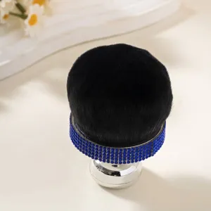 Detailed view of soft large mushroom head powder brush with blue rhinestones
