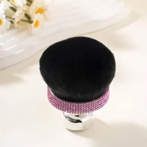 Close-up of super soft mushroom head powder brush with pink rhinestones