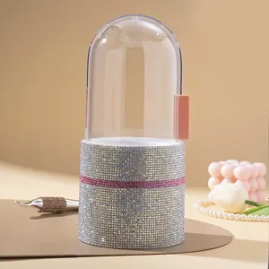Luxury rhinestone-encrusted makeup brush holder storage box with clear capsule dome lid.
