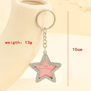 Elegant star shaped photo frame keychain with sparkling rhinestones 10cm length