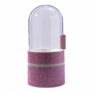 Elegant rhinestone encrusted makeup brush storage container with clear capsule lid