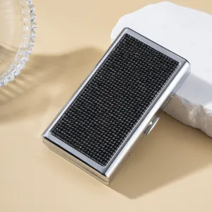Elegant silver cigarette case with black rhinestone embellishment for business gift