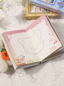 Detailed view of open notebook pages featuring a cute cat illustration and pixel art style