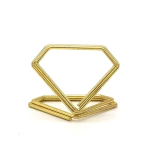 Gouden metalen diamantvormige memo houder en visitekaartjes standaard voor decoratie.