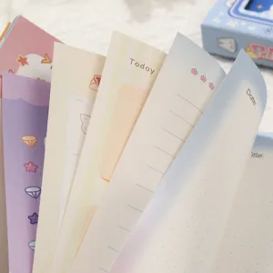 Full-color pixel art game notebook handbook showing various cute inner page designs