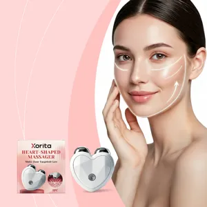 Appareil de massage facial en forme de cœur avec rouleaux pour soin et lifting ciblés.