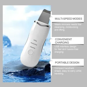 Electric facial skin scrubber detail showing multi-speed modes and USB charging port.