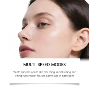Detail view of electric facial cleansing spatula showing multi-speed skincare functions.