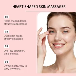 Vue détaillée du masseur facial compact en forme de cœur avec double rouleau pour les soins.