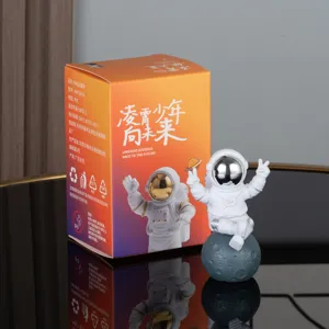 Cute astronaut figurine toy with packaging box, perfect desktop decoration gift for kids and friends.