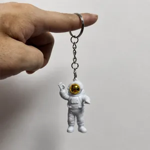 Cute white astronaut keychain with gold visor metal ring keyring compact design backpack pendant