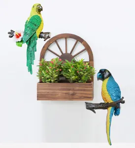 Coppia di figurine di pappagalli 3D realistici su rami per decorazione murale creativa