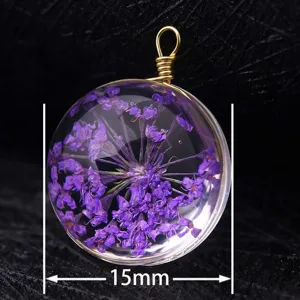 Detailed macro view showing the 15mm diameter of a handmade purple dried flower pendant.