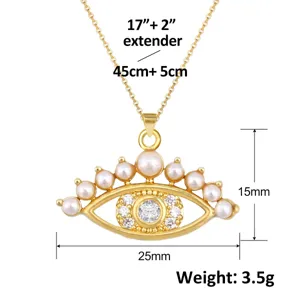 Detail van gouden boze oog hanger ketting met parels en afmetingen weergegeven