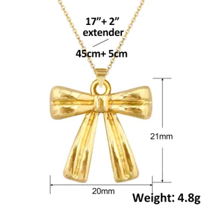 Nahaufnahme des 18k Gold Schmetterlingsschleifen-Anhängers mit Größenangaben